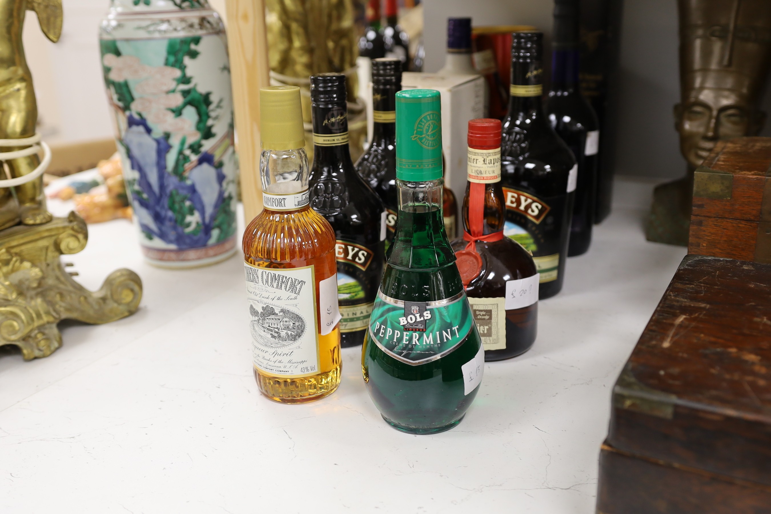 An assortment of liqueurs and others, to include baileys, southern comfort, grand marnier, etc.